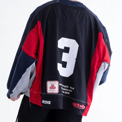 DISCOVERED FOOTBALL SWEAT