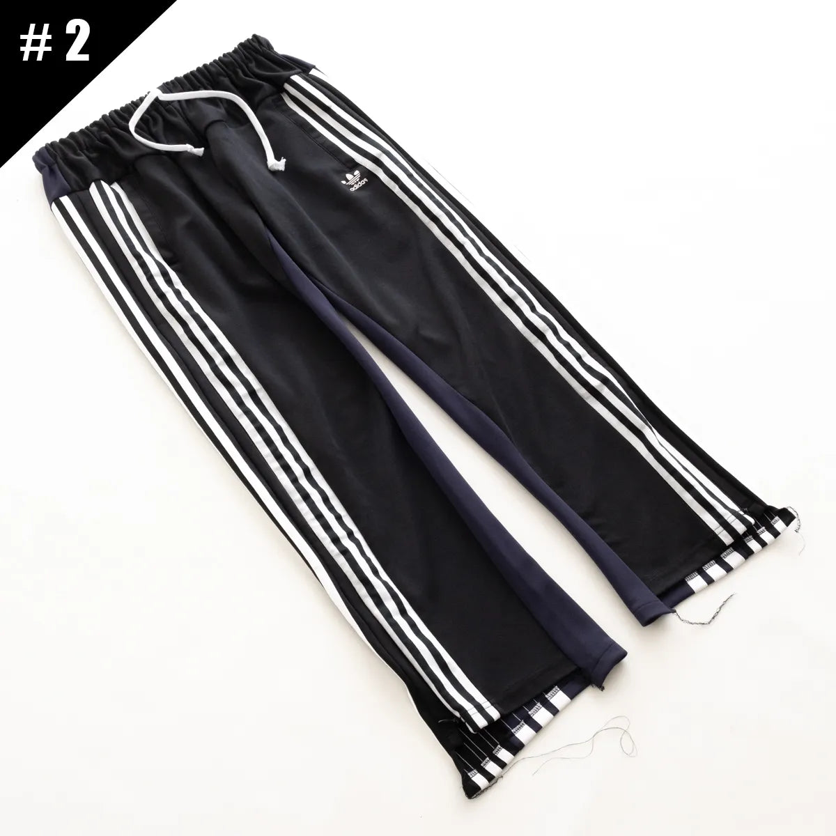 DISCOVERED DOCKING WIDE TRACK PANTS（2型）